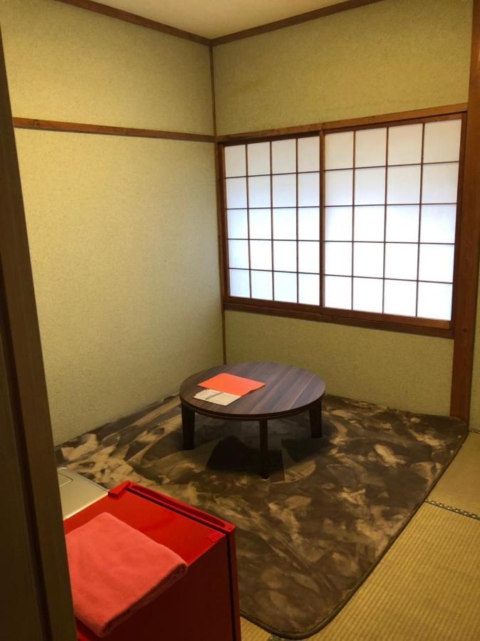 Готель Oyado Zen Кусацу Екстер'єр фото